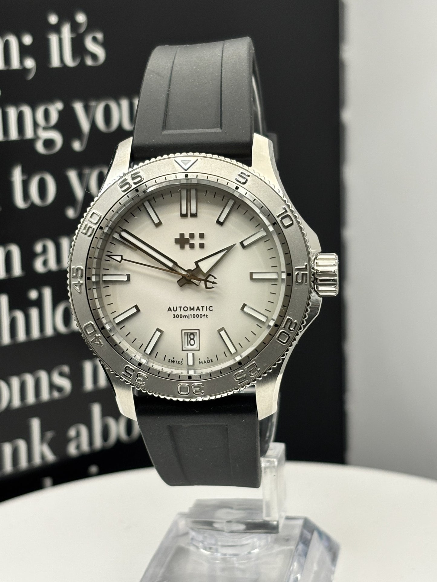 Christopher Ward C60 Atoll 300 watch on a rubber strap.