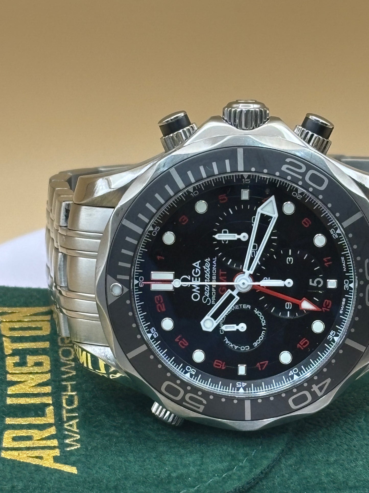 Omega Seamaster GMT Chronograph wrist watch on a steel Omega bracelet.