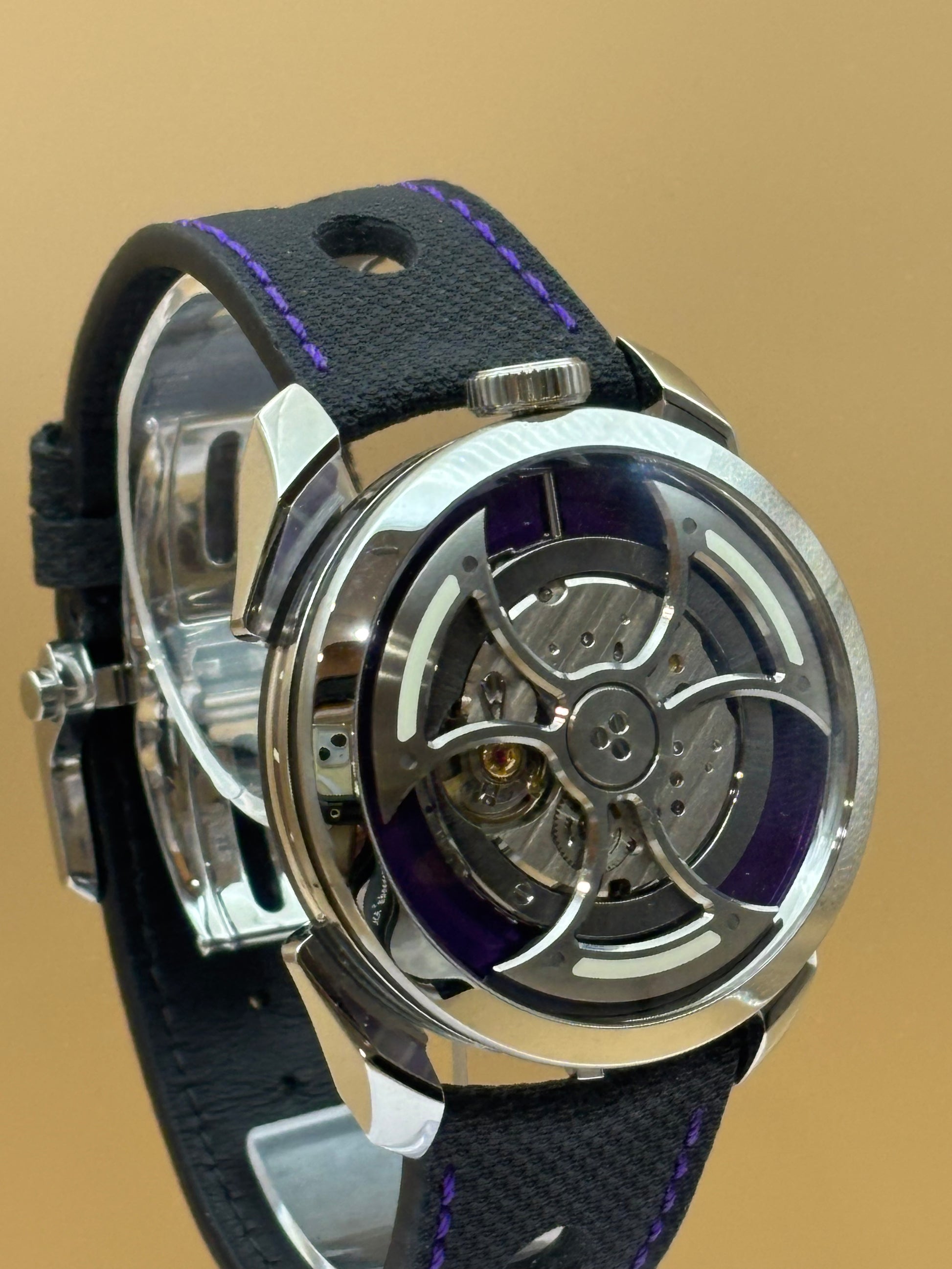 MB&F PURPLE M.A.D 1s Edition wrist watch on leather strap.