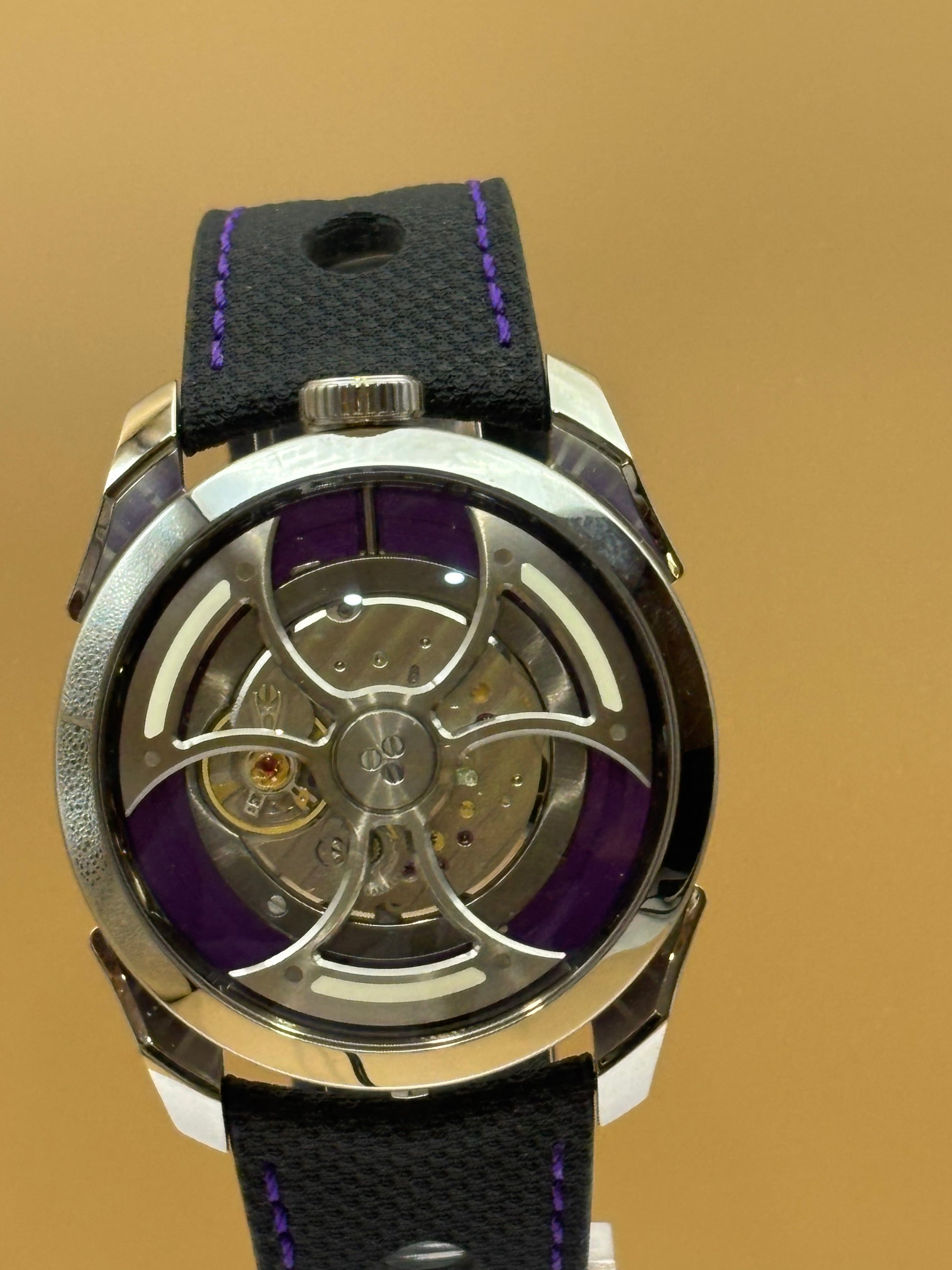 MB&F PURPLE M.A.D 1s Edition wrist watch on leather strap.