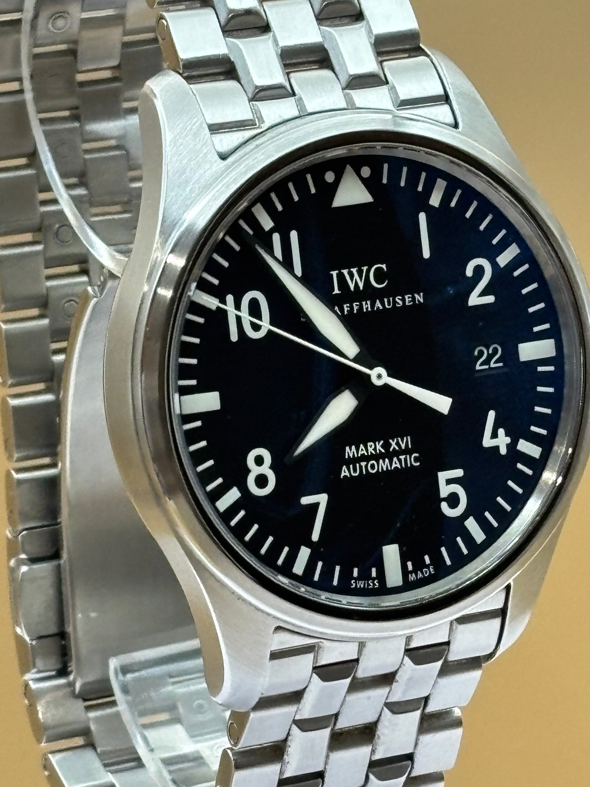 IWC Pilot Mark 16 wrist watch with a steel bracelet.