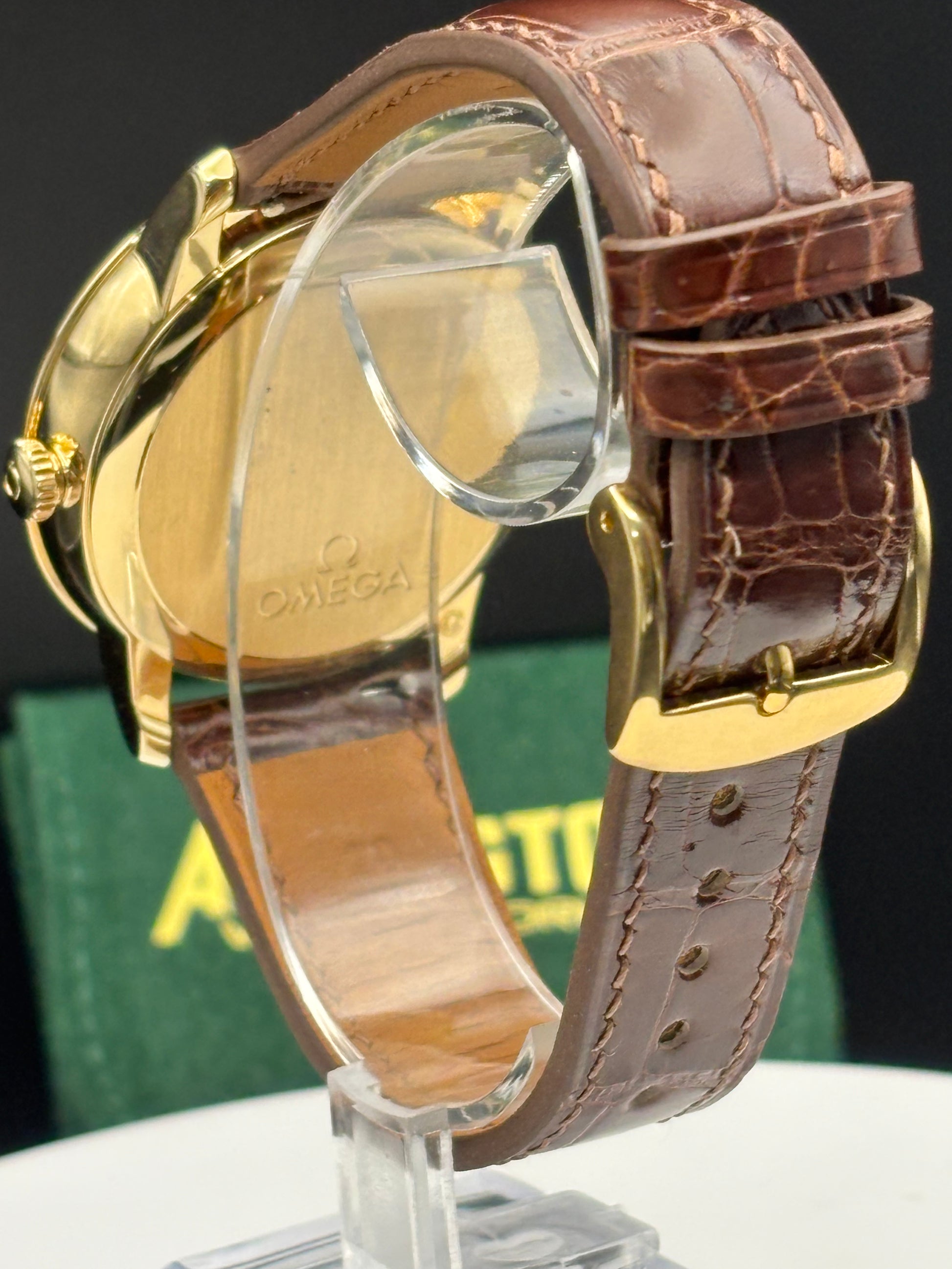 Omega De Ville Prestige 18K Solid GOLD Watch on an alligator watch.