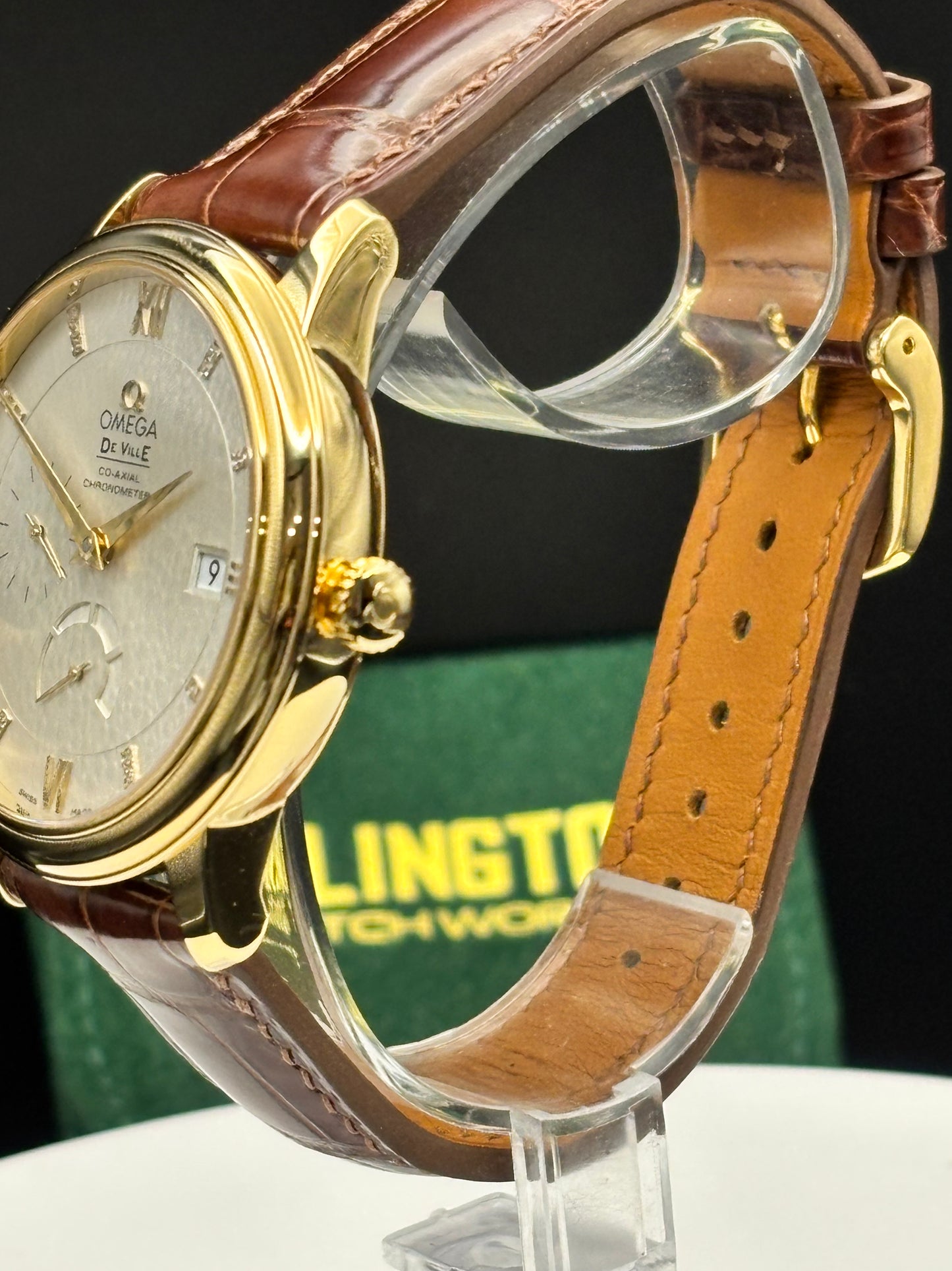 Omega De Ville Prestige 18K Solid GOLD Watch on an alligator watch.