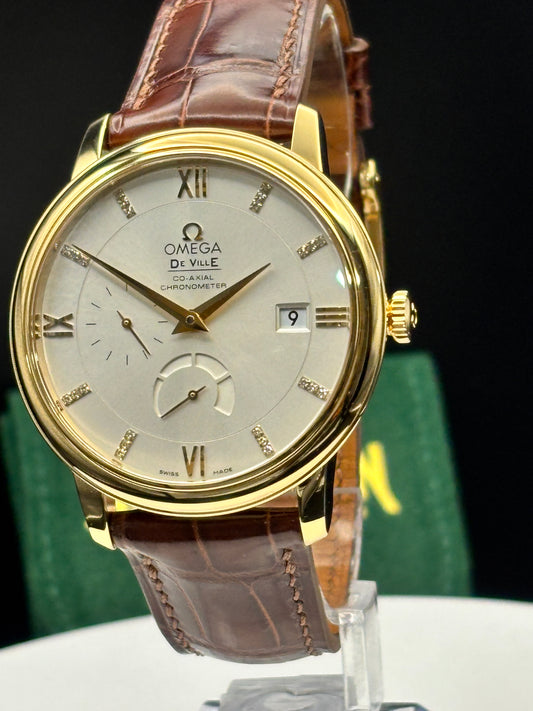 Omega De Ville Prestige 18K Solid GOLD Watch on an alligator watch.