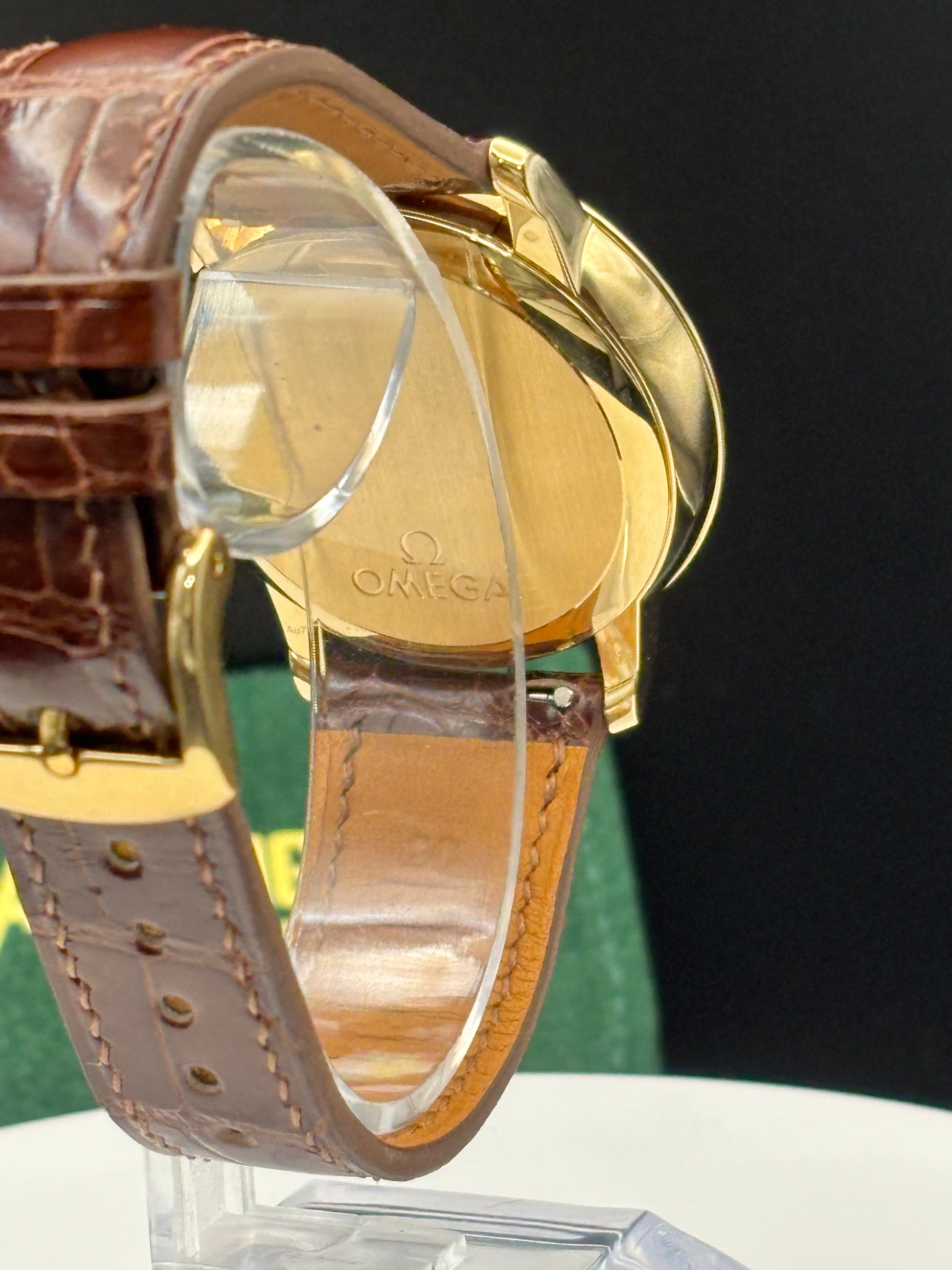 Omega De Ville Prestige 18K Solid GOLD Watch on an alligator watch.