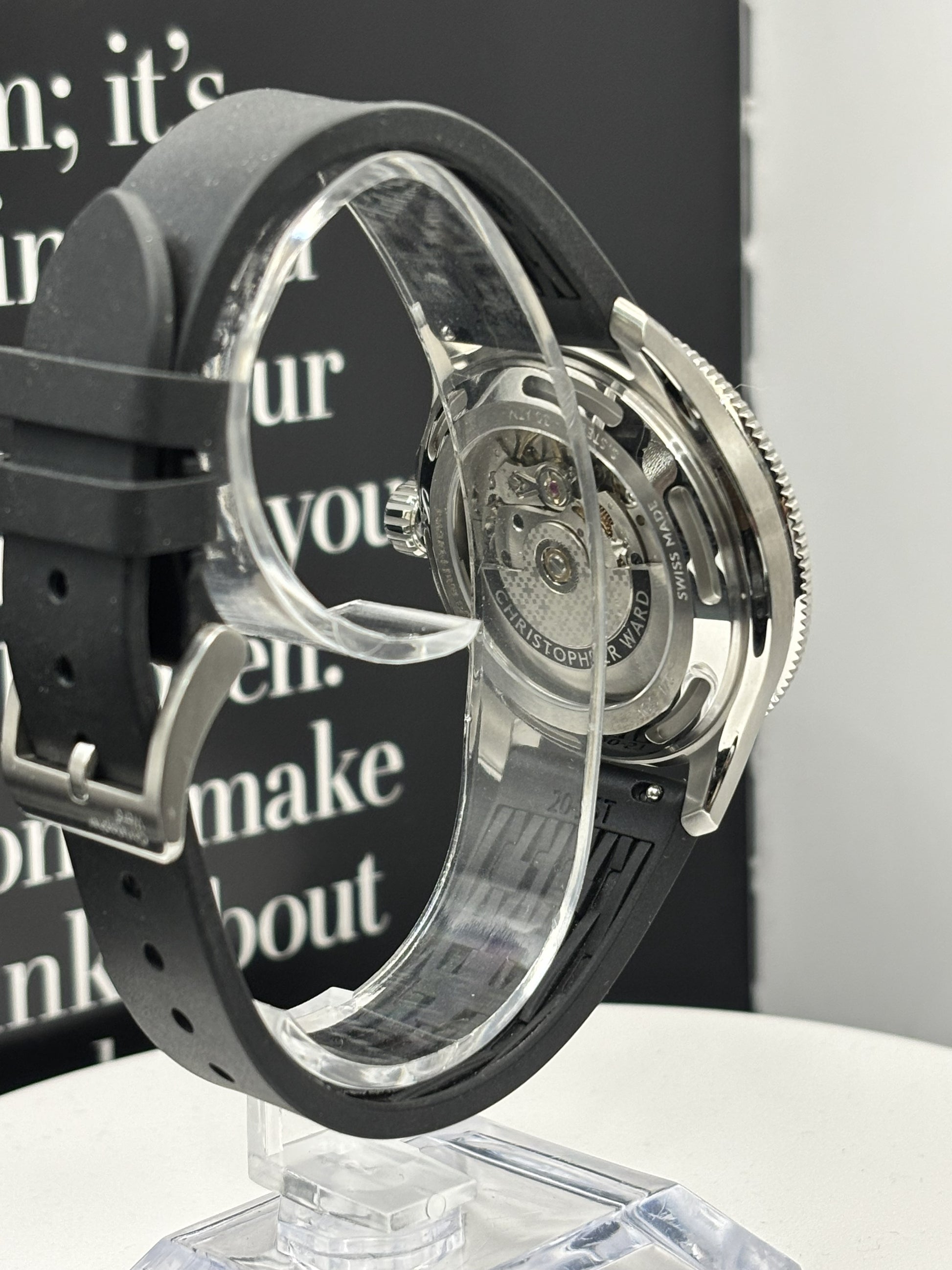 Christopher Ward C60 Atoll 300 watch on a rubber strap.