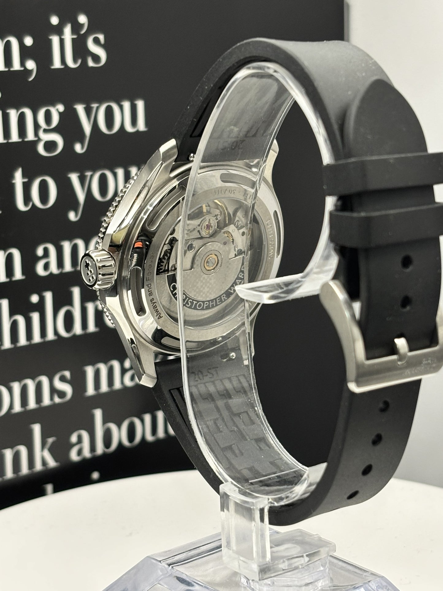 Christopher Ward C60 Atoll 300 watch on a rubber strap.