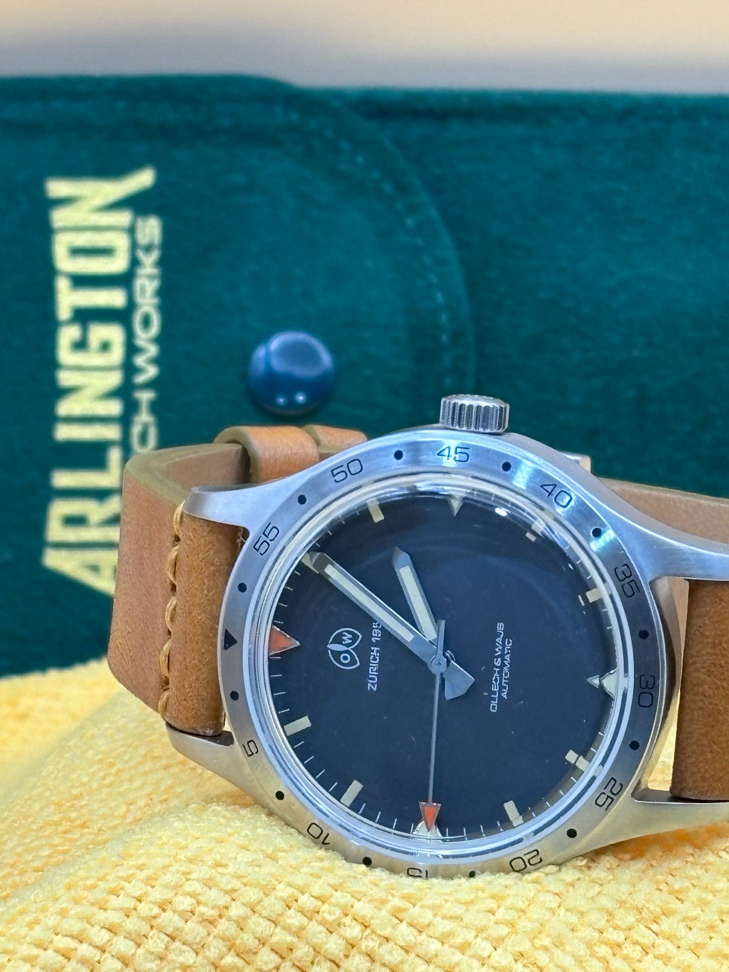 Ollech & Wajs 56-M wrist watch on a leather band.