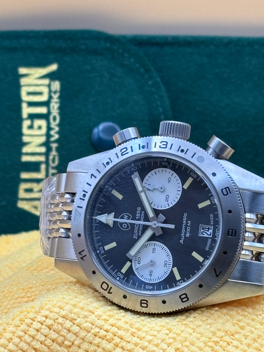 Ollech & Wajs Chronograph Navichron S - Wrist watch with steel bracelet.