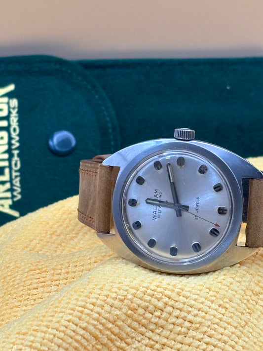 Waltham watch on a leather band.