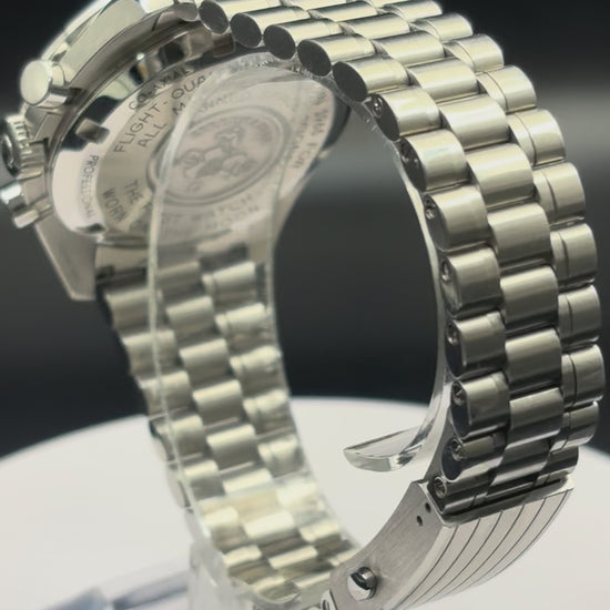 Omega Speedmaster Moonwatch on steel bracelet.