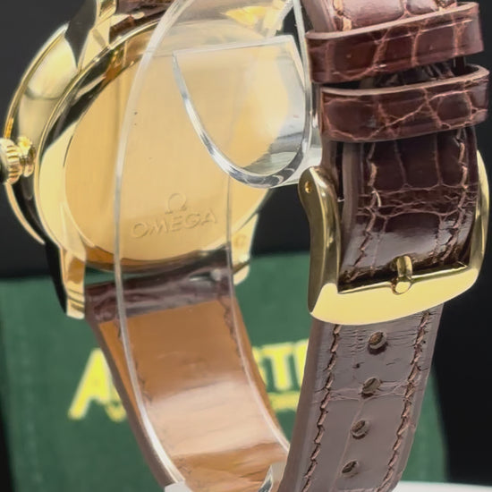 Omega De Ville Prestige 18K Solid GOLD Watch on an alligator watch.